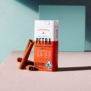 Petra Cinnamon CBD Mints tin with brown label and cinnamon sticks